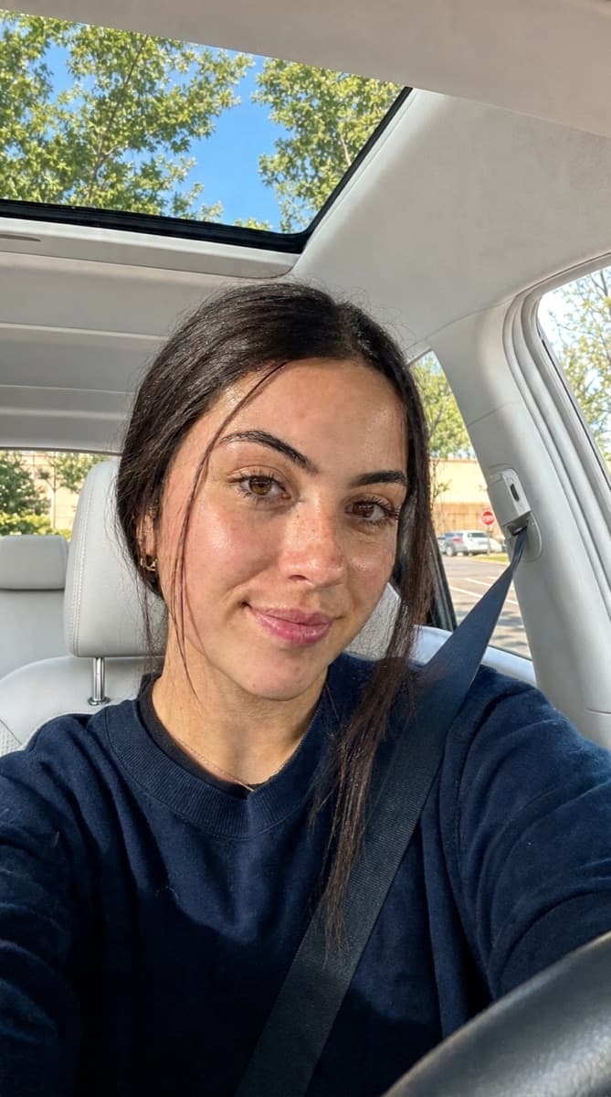 AI avatar taking a selfie in a car