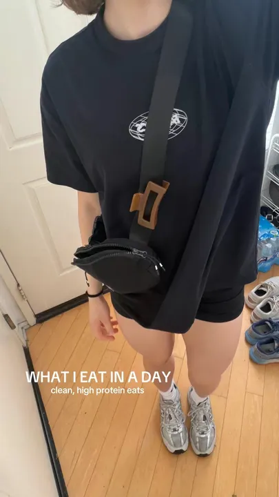 TikTok slideshow cover: WHAT I EAT IN A DAY clean, high protein eats