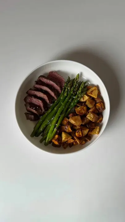 TikTok slideshow cover: Steak and Asparagus Dinner