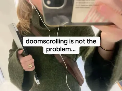 TikTok slideshow cover: doomscrolling is not the problem...