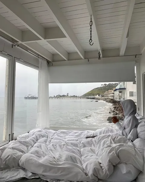 TikTok slideshow cover: Ocean view bedroom